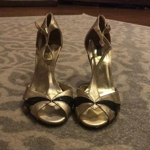 Gold and black heels